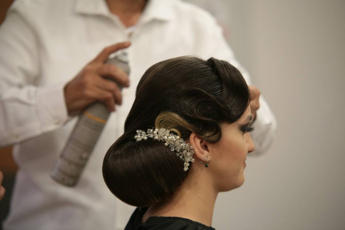 Before-and-after of bride's hair: morning setup vs. post-dancing at midnight, both intact