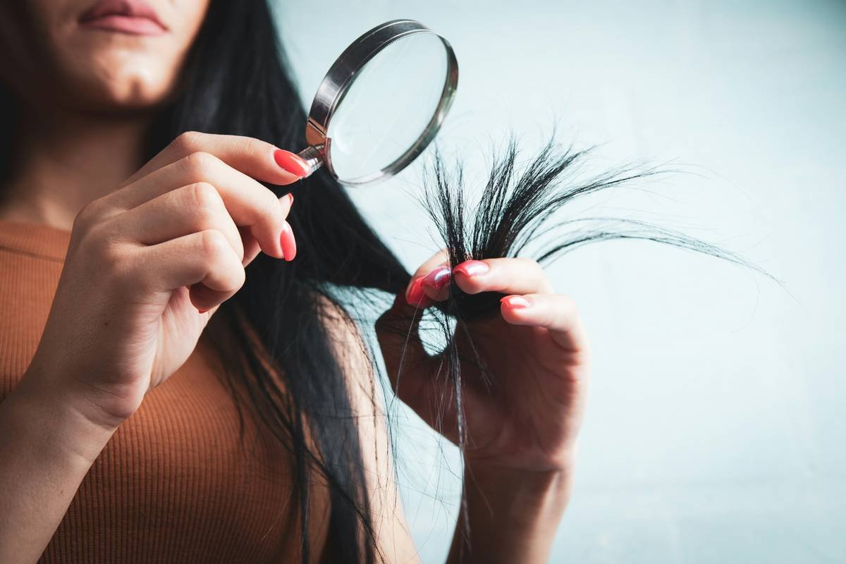Infographic showing cross-sections of damaged vs healthy hair shafts caused by different hair tie materials