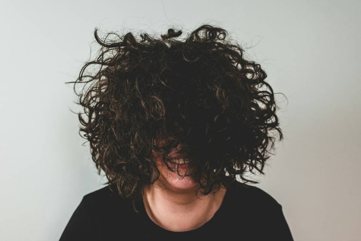 Why Your Hair Pins Keep Slipping—And How a Texturizing Spray Fixes It Instantly